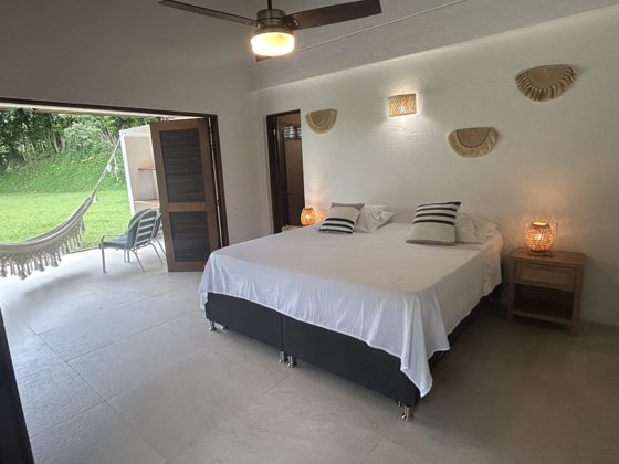 Chambre de la Villa Las Guacamayas ouverte sur le jardin et les montagnes
